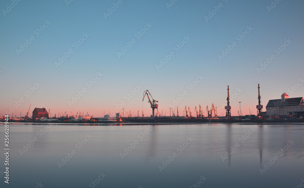 Fototapeta Fishing port with river and ship in spring sunny evening