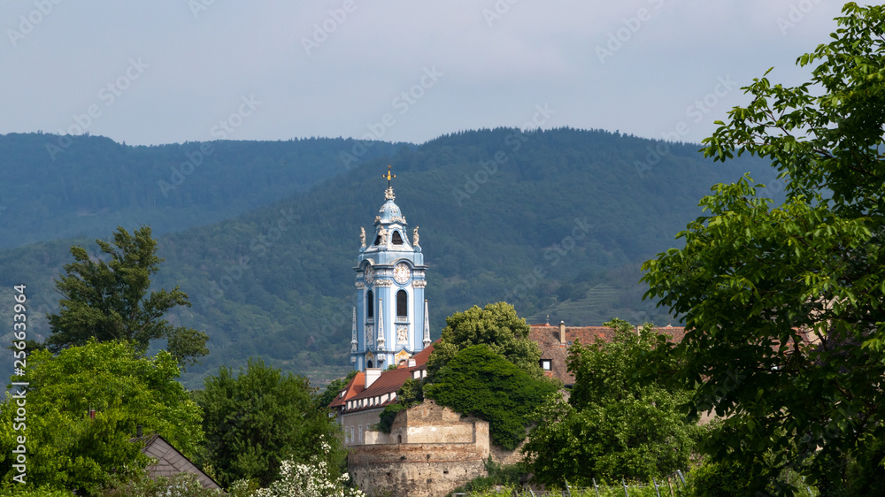 Cityscape with blue tower of a church in Durnstein