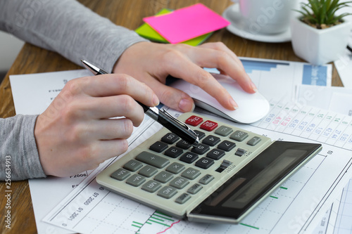 female hand with objects for doing business in the office