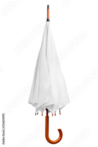 White closed umbrella isolated on white background. Blank folded umbrella on white background