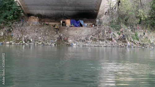 Rome Tiber River homelesses live under an urban bridge