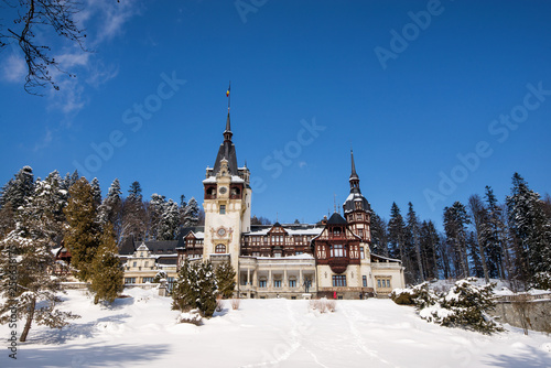 Peles castle in Romania. Beautiful, royal castle in snowy, white winter. 