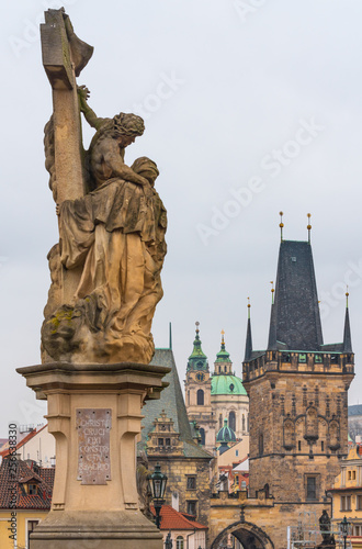 Prague, Czech Republic. The statue of St. Lutgardis is an outdoor sculpture of the Charles Bridge. On the statue in Latin words "Christ crucified constricted his arm". 
