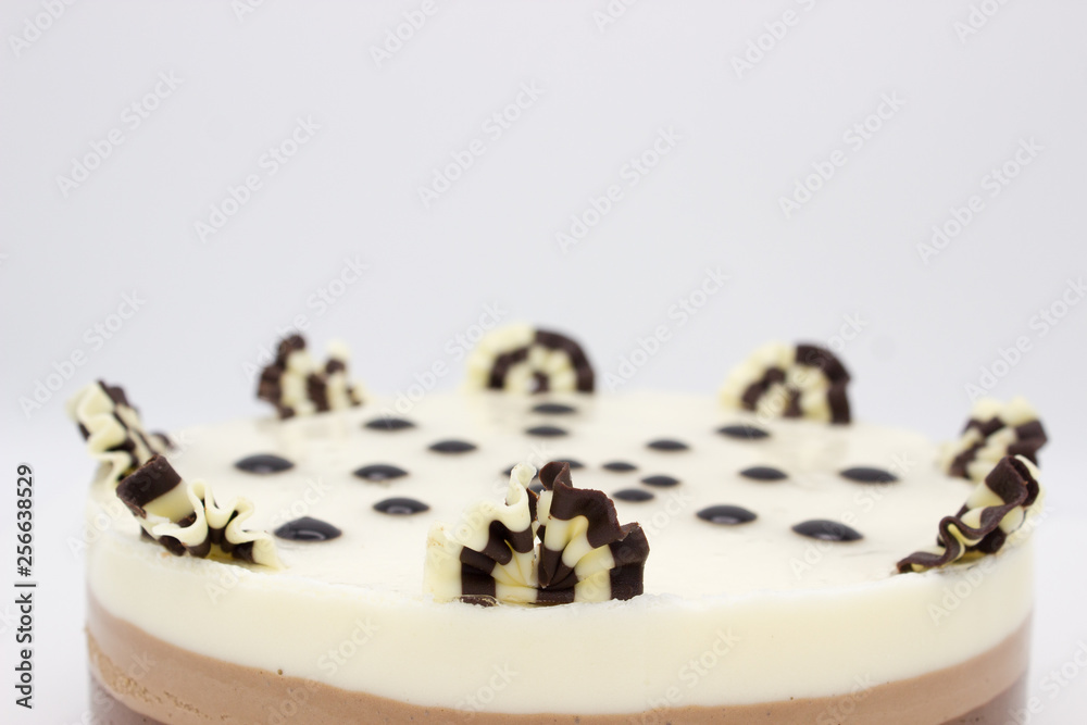 Chocolate cake. Cake of several varieties of chocolate: black, milk and white. Chocolate cake. Cake of several varieties of chocolate: black, milk and white.