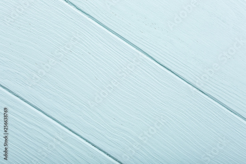 Blue, turquoise wooden plank background. Diagonal stripes