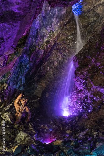 Underground waterfall in an old gold mine and arsenic
