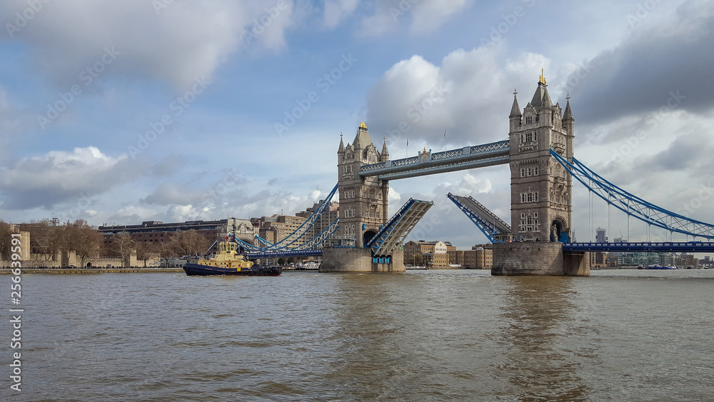 Tower Bridge open on the River Thames