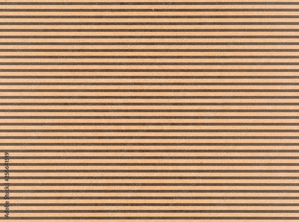 Brown craft paper with a black horizontal stripes Brown craft paper with a black horizontal stripes