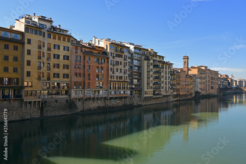 Sunny day on the shores of the Arno river in Florence