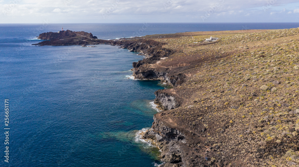 Aerial view of the lighthouse Teno on The Tenerife, Canary Islands, Spain. Wild Coast of the Atlantic Ocean Aerial view of the lighthouse Teno on The Tenerife, Canary Islands, Spain. Wild Coast of the Atlantic Ocean
