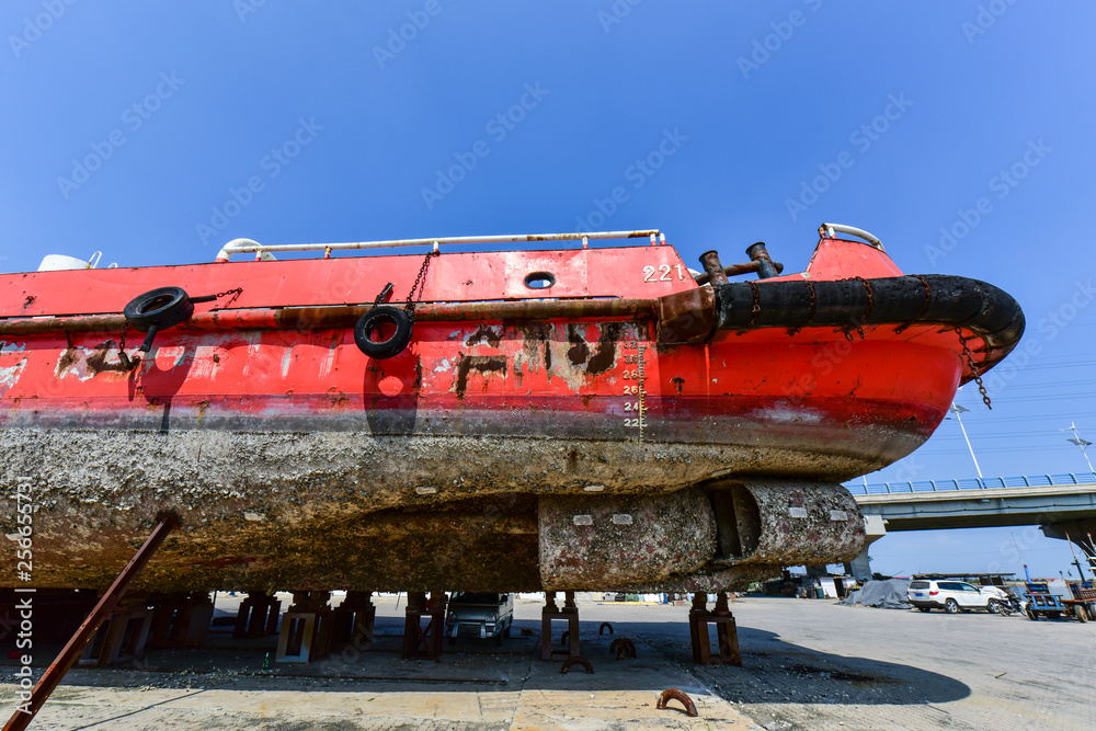 Fototapeta premium Close-ups of various vessels undergoing maintenance and repair