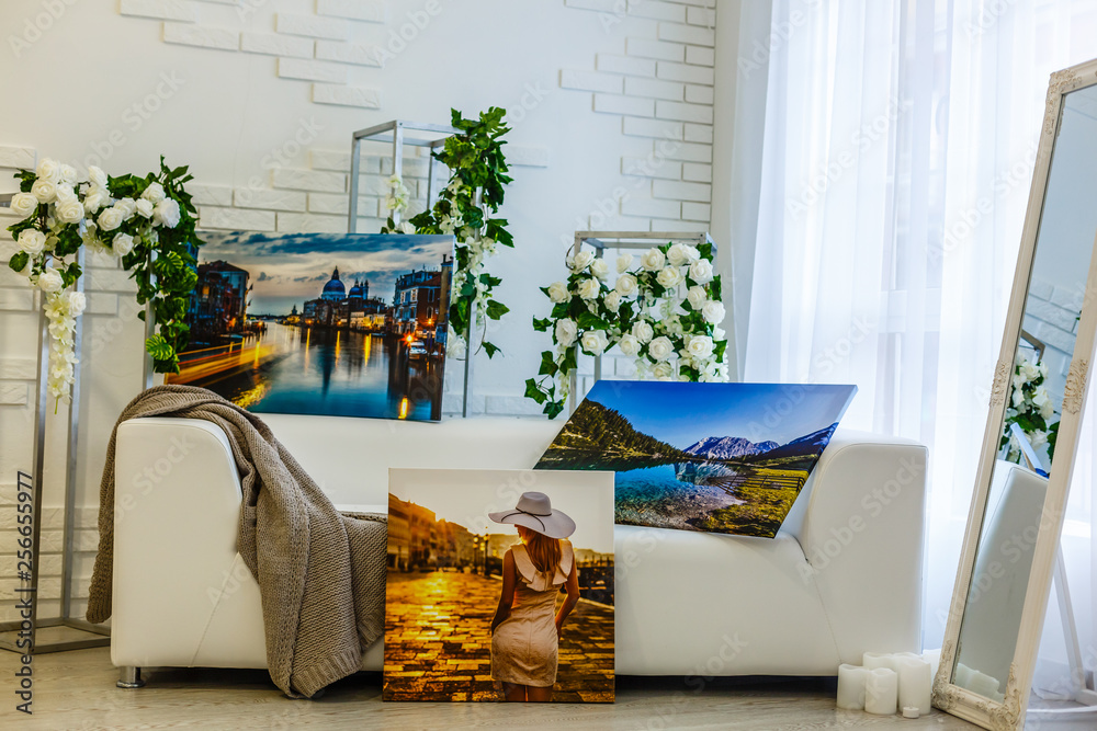 Modern lliving room interior with Cliffs of Moher canvas on the wall - it is my photo available in shutterstock gallery - obrazy, fototapety, plakaty 