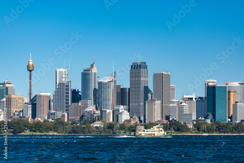 Sydney Central Business District cityscape with ferry boat © Olga K