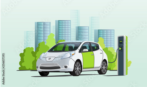 Electric car charging at charger station, cityscape on background