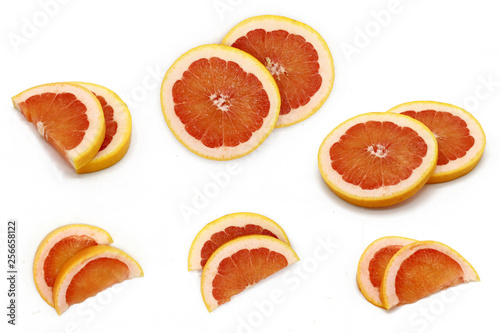 grapefruit - set of fresh  sliced grapefruit pices  isolated on white