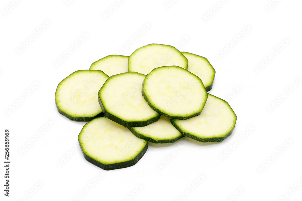 fresh zucchini slices - isolated on white fresh zucchini slices - isolated on white