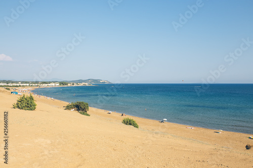 Fototapeta Naklejka Na Ścianę i Meble -  A view of beach on Corfu, Greece, one of the Island's most popular resorts