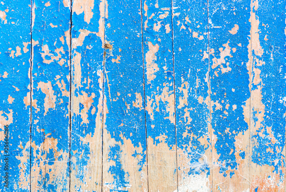 old board with peeling paint blue old board with peeling paint blue