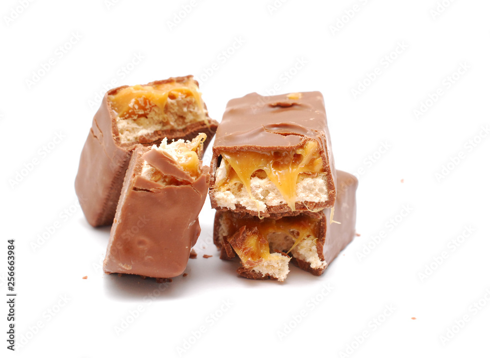 chocolate and nuts energy bar on white close up photography image chocolate and nuts energy bar on white close up photography image