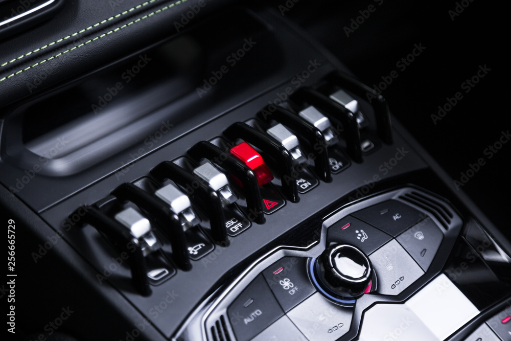 Fototapeta premium Control panel with buttons in sports car interior