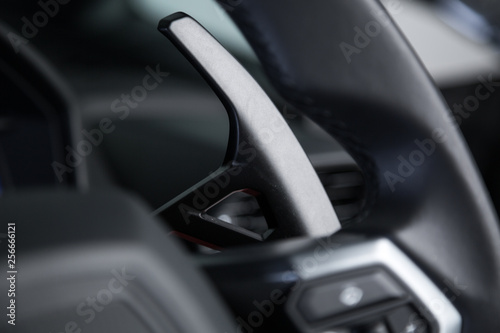 Paddle shifting in sports car interior © camerarules