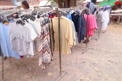 shop clothes for sales at market © oilslo