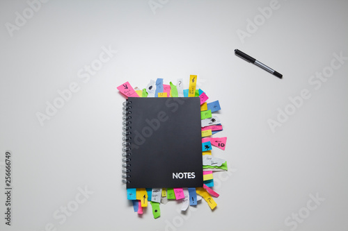 Note pad full of post it notes