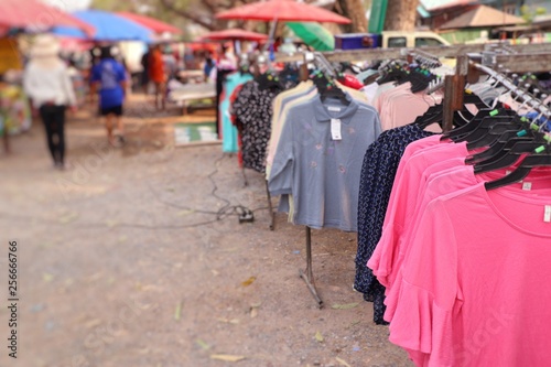 shop clothes for sales at market © oilslo