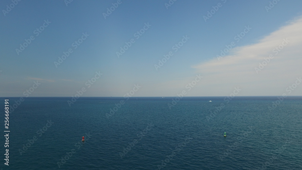 A blue horizon on the way out of the harbor of Miami A blue horizon on the way out of the harbor of Miami