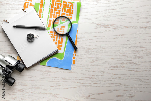 Map with compass, magnifier...