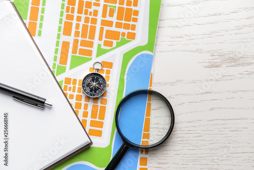 Map with compass and magnif...