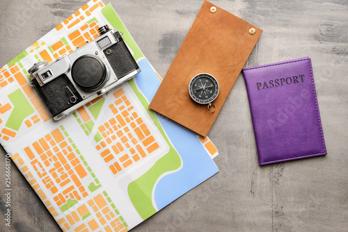 Map with compass, photo cam...