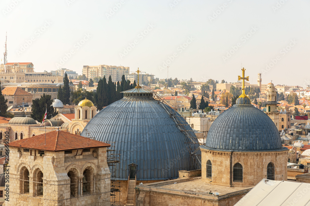 Naklejka premium View from top on two domes and belfry of the Church of the Holy Sepulchre in Jerusalem