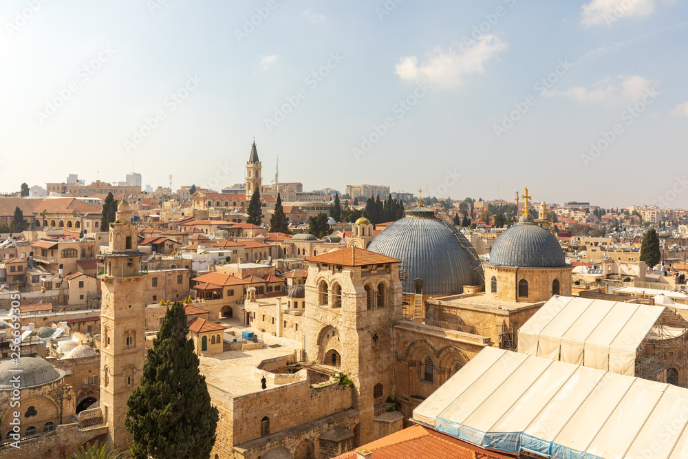 Wide view from top on two domes and belfry of the Church of the Holy Sepulchre and Omar's mosque in Jerusalem