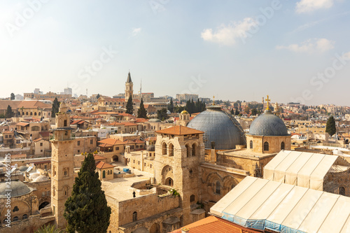Wide view from top on two domes and belfry of the Church of the Holy Sepulchre and Omar's mosque in Jerusalem