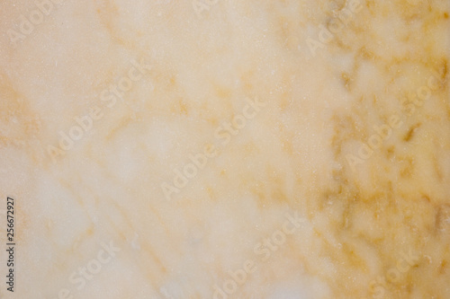 Yellow white marble surface stone background