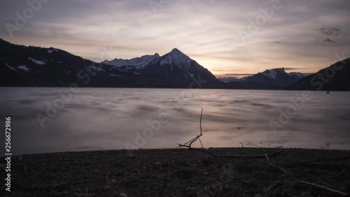 Timelapse of a sunset at the Lake Thun in Switzerland photo