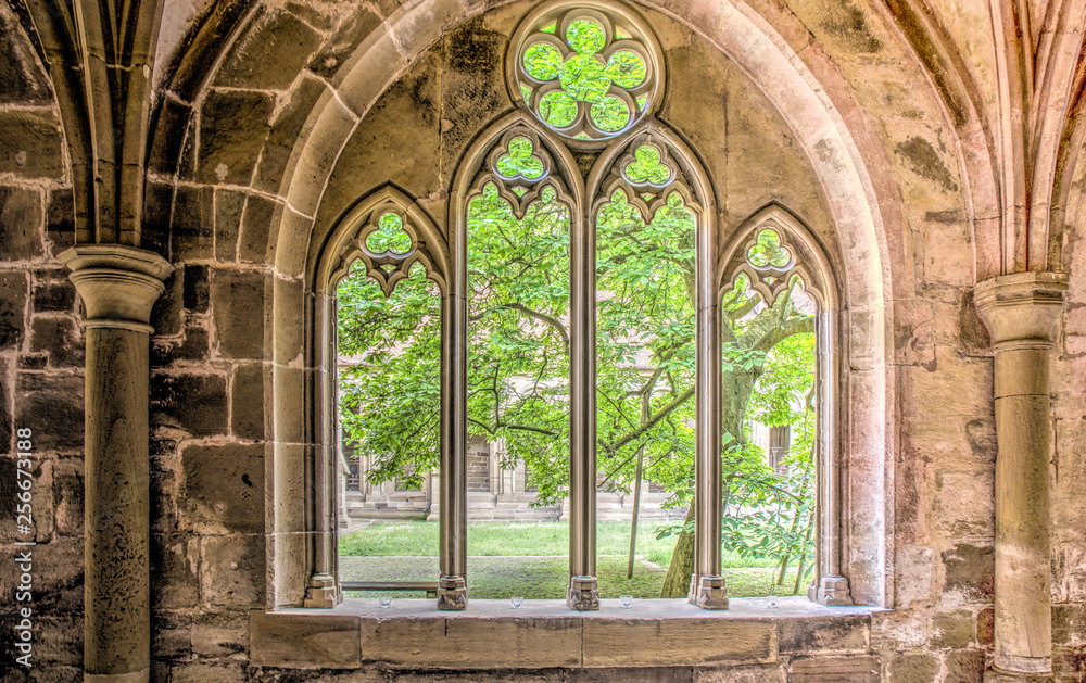 stone window arch in hallway of monastery maulbronn - obrazy, fototapety, plakaty 
