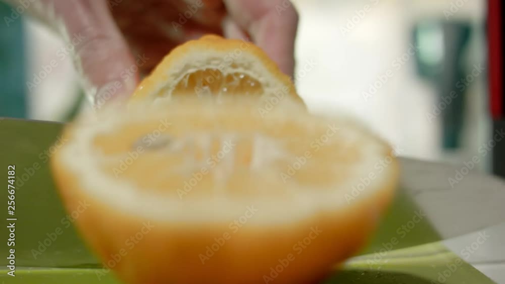 Slicing a Bitter Orange in Half Slicing a Bitter Orange in Half