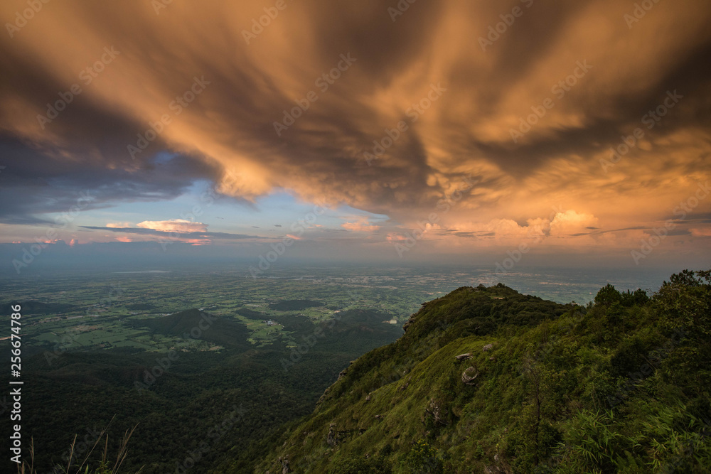 Sunset on top of thailand mountain.