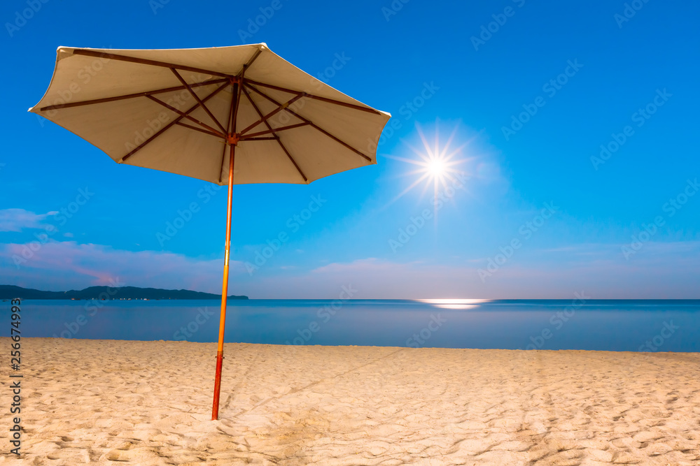 Boracay beach skyline with an umbrella during an early morning