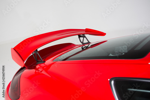 Rear spoiler on red sports car