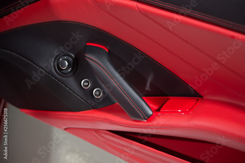 Close up of dual tone leather car door panel