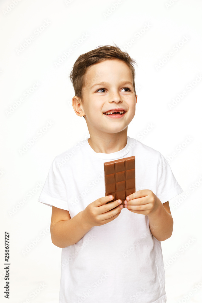 little beautiful boy holding chocolate studio shot little beautiful boy holding chocolate studio shot