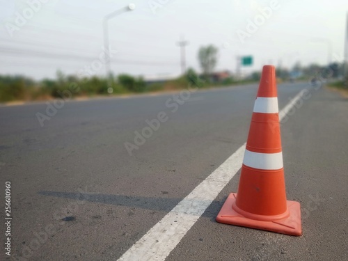 traffic cones on road © suwichan