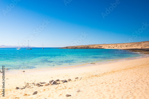 paradise beach with clear ocean water in La Graciosa Island