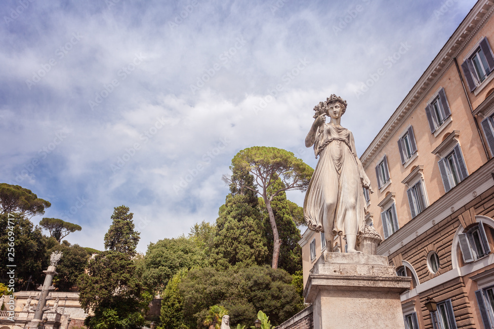Statue of Summer on Piazza del Poplo in Rome Italy