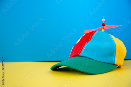 A colorful propeller hat on a background.