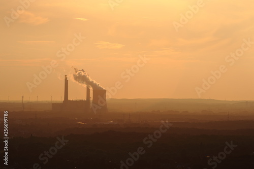 industrial power plant at sunset