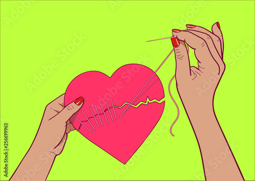 Stitching up the torn heart with needle and thread